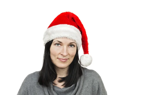 beyaz bitti izole Noel Baba şapkası giyen güzel kadın