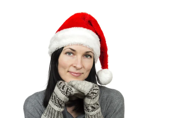 beyaz bitti izole Noel Baba şapkası giyen güzel kadın