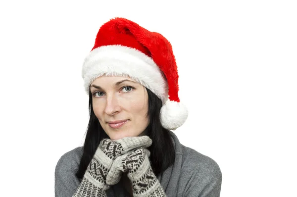 beyaz bitti izole Noel Baba şapkası giyen güzel kadın