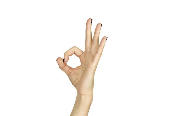 female hand making ok sign isolated over white