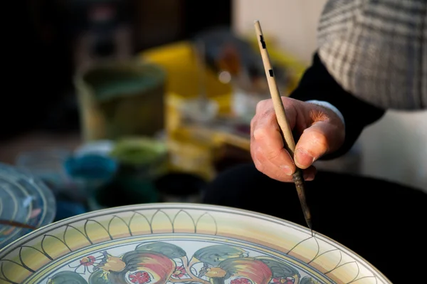 Pottery decorating Stock Image