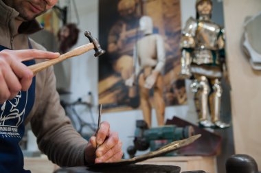 Sicilian puppet artisan at work clipart