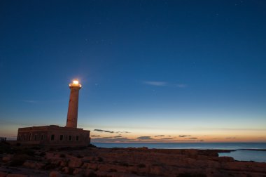 Lighthouse and starry night