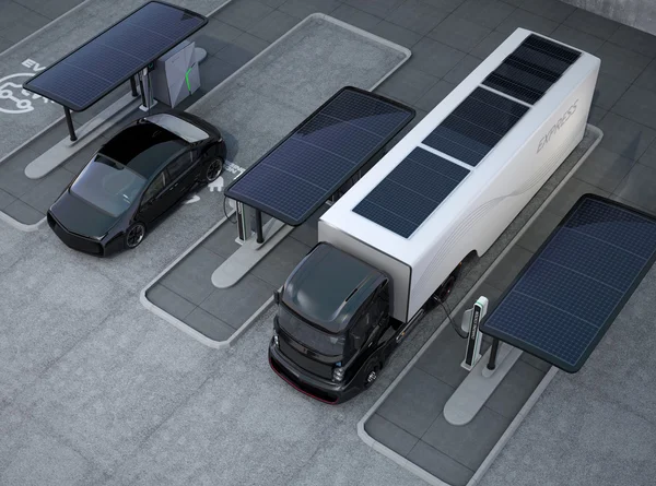 Hibrid elektrikli kamyon ve beyaz elektrikli araç şarj istasyonu içi