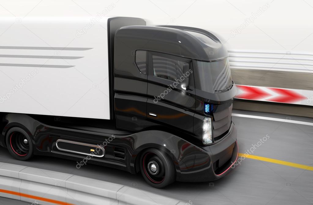 Autonomous hybrid truck driving on highway.