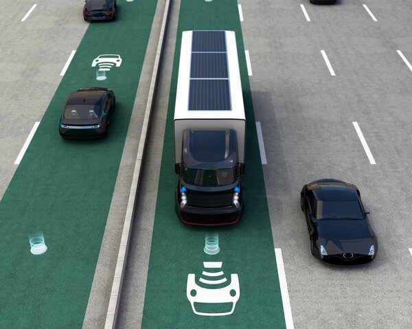 Hybrid truck and blue electric car on wireless charging lane