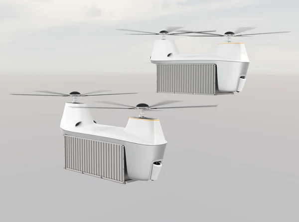 Dos drones que transportan contenedores de carga volando en el cielo — Foto de Stock