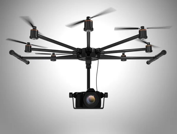 Octocopter พกกล้อง DSLR ที่แยกจากพื้นหลังสีเทา — ภาพถ่ายสต็อก