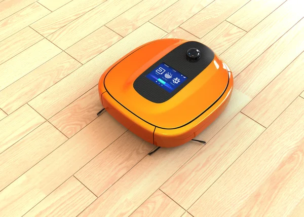 Metallic orange robotic vacuum cleaner moving on flooring — Stock Photo, Image