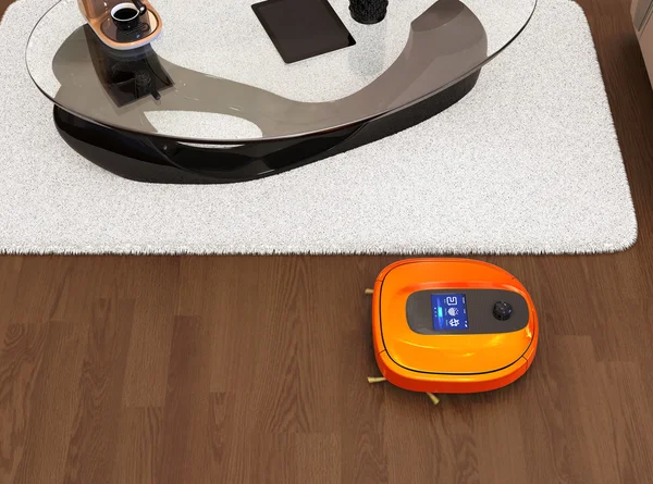 Robotic vacuum cleaner moving on flooring — Stock Photo, Image