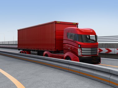 Red container truck on the highway clipart