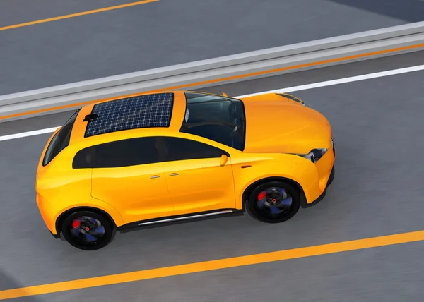 SUV eléctrico amarillo en la carretera —  Fotos de Stock