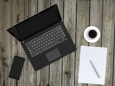 Akıllı telefon, laptop ve ahşap güverte üzerinde kahve fincanı