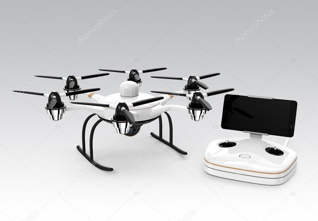 Hexacopter and remote controller isolated on gray background