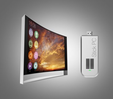 Stick türü bilgisayar ve eğri televizyon gri arka plan üzerinde izole