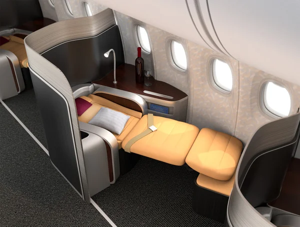 Närbild av lyxiga business class-plats med metalliskt silver partition. — Stockfoto