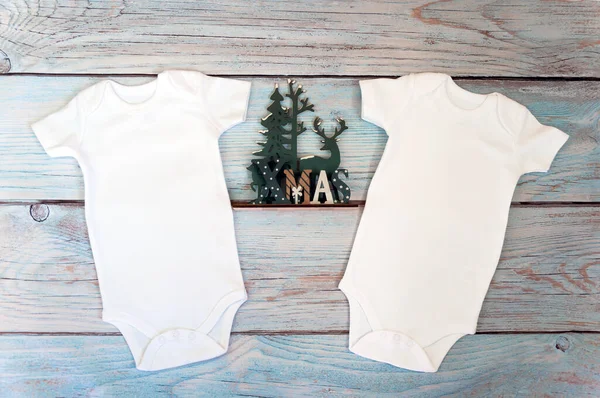 Layout Flat Put Two Christmas White Baby Bodysuit Wooden Background — Stock Photo, Image