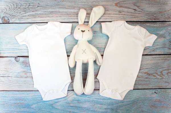Layout Flat Put Two White Baby Bodysuit Wooden Background Rabbit — Stock Photo, Image