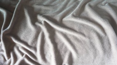Dizayn için buruşmuş kumaş dokusu soyut arkaplan.
