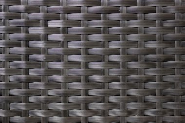 Koyu kahverengi rattan doğal desenli dokuma.