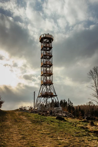 Metal wooden Lookout tower called Feistuv kopec near Olesnice village, Orlicke Mountains, Czech republic. Czech modern outdoor architecture.Time for leisure time activities.Weekend trip to nature.