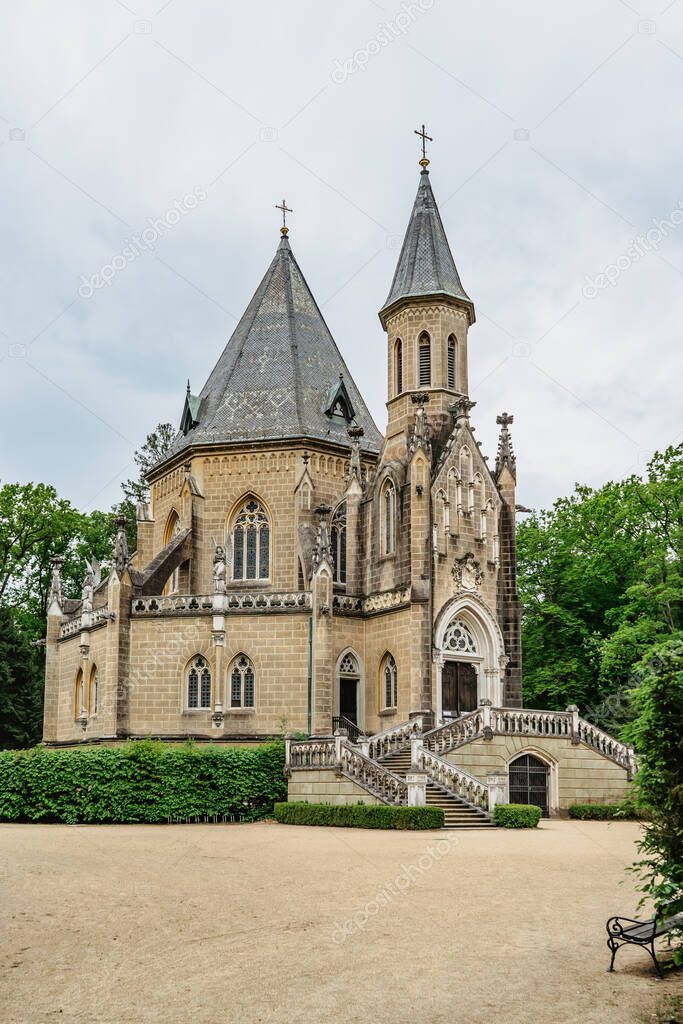 Spring view of Schwarzenberg Tomb near Trebon, Czech Republic.Neo-gothic building with tower and majestic double staircase is surrounded by English park.Architectural popular tourist monument.