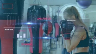 Metin, istatistik tarama ve kadın boksör boks torbası üzerindeki veri işleme ile dijital arayüzün animasyonu. Dijital olarak oluşturulan küresel bilgisayar ağı teknolojisi kavramı.