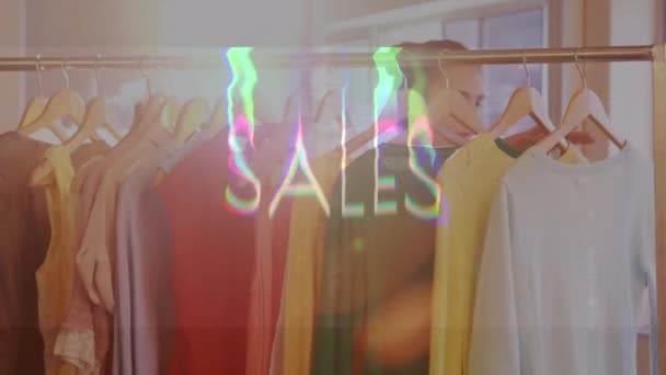 Digital Animation Salgstekst Statisk Effekt Mod Kvinde Vælge Kjoler Butik – Stock-video