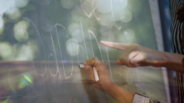Animation Schoolboy Writing Chalk Chalkboard Female Teacher Helping Him School — Stock Video