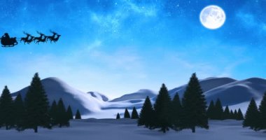 Noel Baba 'nın kızak içindeki siyah siluetinin dijital animasyonu gece gökyüzünde Ay' a karşı kışın ren geyikleri tarafından çekiliyor. Noel kutlaması geleneği