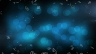 Siyah zemin üzerinde mavi ışık lekeleri üzerinde hareket eden kar tanelerinin dijital animasyonu. Noel kutlaması geleneği