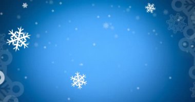 Mavi arka plana düşen Noel süsleri ve kar tanelerinin animasyonu. Noel kutlaması konsepti dijital olarak oluşturulmuş görüntü.