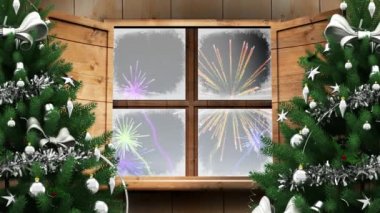 Noel ağacının dijital animasyonu ve havai fişeklere karşı ahşap pencere çerçevesi. Noel kutlaması geleneği