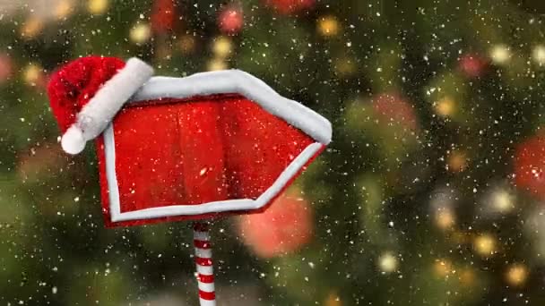 Animación Digital Nieve Que Cae Sobre Sombrero Santa Poste Rojo — Vídeos de Stock