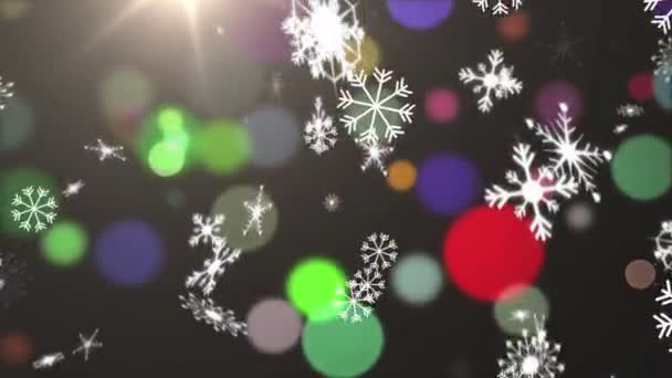 Digitální Animace Sněhových Vloček Dopadajících Pestrobarevné Skvrny Světla Černém Pozadí — Stock video