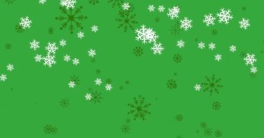 Yeşil arka planda kar taneleri düşen kış manzarasının animasyonu. Noel kutlaması konsepti dijital olarak oluşturulmuş görüntü.