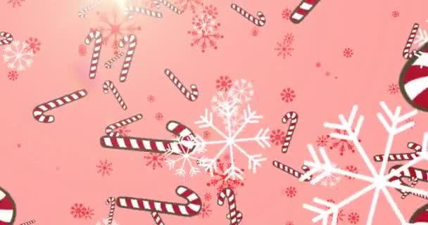 Анимация Свечных Тростей Снега Падающего Розовом Фоне Концепция Празднования Рождества — стоковое видео