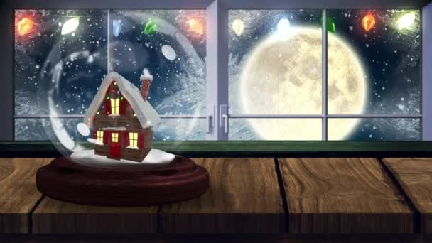 Animatie Van Twee Sneeuwbol Met Huis Met Winterlandschap Volle Maan — Stockvideo