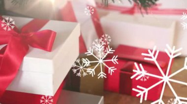 Arka planda birden fazla kar tanesinin Noel 'de düşüşünün animasyonu var. Noel mevsimleri şenlik kutlaması konsepti dijital olarak oluşturuldu.