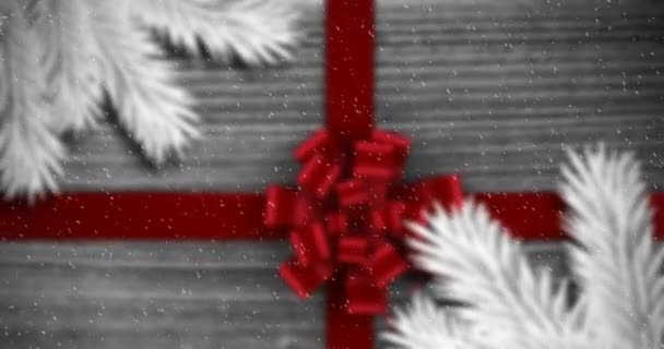 Animering Jul Dekoration Med Grenar Rött Band Och Snö Faller — Stockvideo
