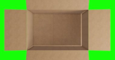 Yeşil ekran arka planında kapağı açık olan boş kahverengi karton kutunun tepesinde. Sevkiyat ya da ulaşım hazırlığı için paket kutusu.