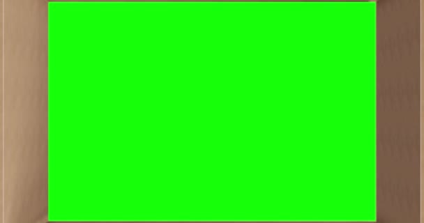 白い背景に蓋を閉じて茶色の段ボール箱の緑の画面のオーバーヘッド 輸送用の梱包箱 — ストック動画