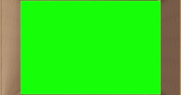 绿色屏幕的头顶在褐色纸板箱上 盖子盖在黑色背景上 准备装运或运输的包装箱 — 图库视频影像