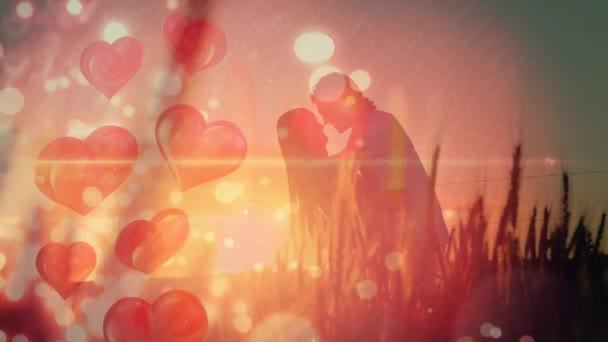 Animacja Czerwonych Serc Plamy Światła Nad Parą Zakochanych Całujących Się — Wideo stockowe