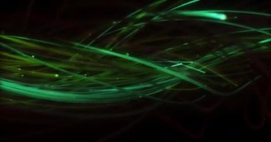 Siyah arka planda hareket eden kıvrımlı yeşil lifler. enerji, renk ve hareket konsepti, dijital olarak oluşturulmuş video.