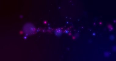 Parlayan pembenin dönen belirsiz şekli ve siyah arkaplanda yüzen ışık noktaları. renk, enerji ve hareket konsepti, dijital olarak oluşturulmuş video.