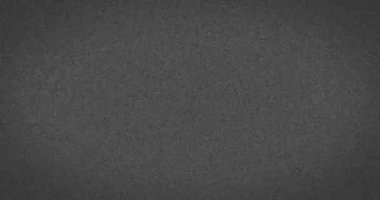 Gri arka planda hızla hareket eden gri soyut gürültü lekelerinin animasyonu. renk ve hareket kavramı dijital olarak oluşturulmuş görüntü.