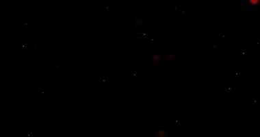 Işığın kırmızı noktaları siyah arkaplan boyunca yavaşça yukarı doğru yüzüyor. enerji, elektrik, renk ve hareket konsepti, dijital olarak oluşturulmuş video.