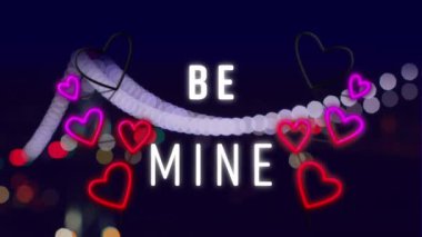 Kelimelerin animasyonu, Bokeh Night City 'de yanıp sönen kırmızı ve pembe neon kalplerle benim olacak. Sevgililer günü, aşk ve romantizm konsepti, dijital olarak üretilen video..