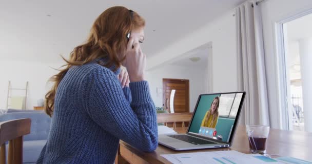 Caucasian Woman Using Laptop Phone Headset Video Call Female Colleague — Stock Video